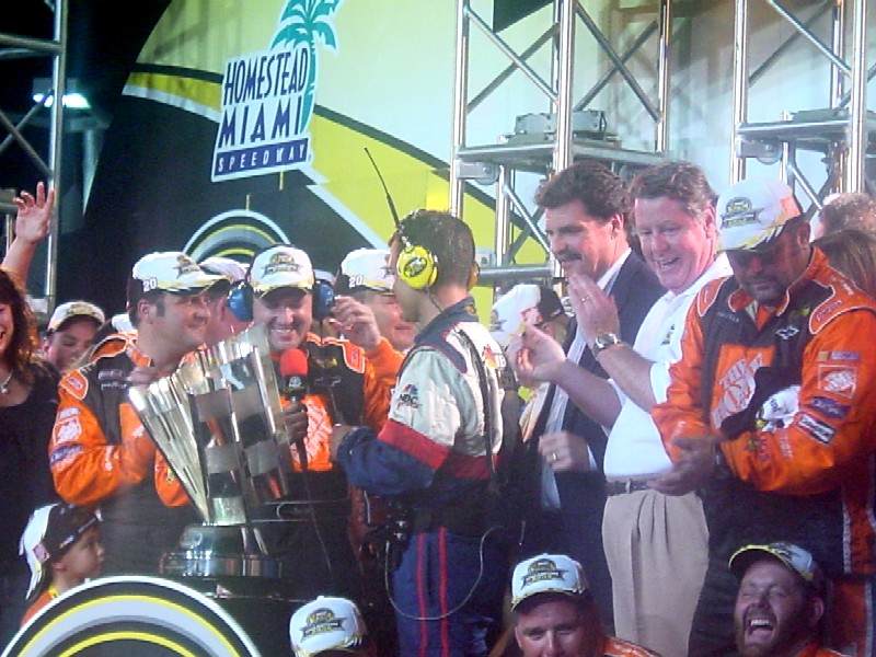 Tony Stewart talking to Joe Gibbs about his victory